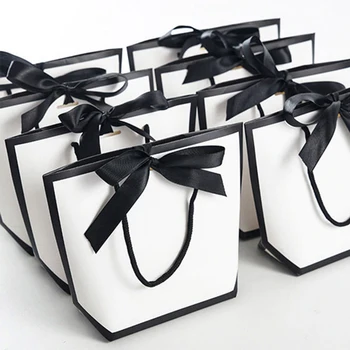 12pcs Бяла и черна чанта за съхранение Преносима с въже дрехи Книги фестивал подарък за бизнес сватба Свети Валентин бижута чанта